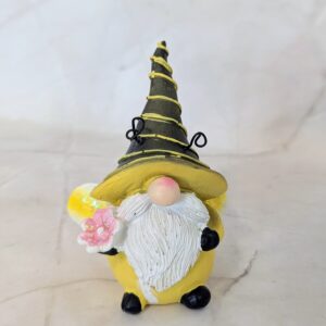 Manó figura virággal